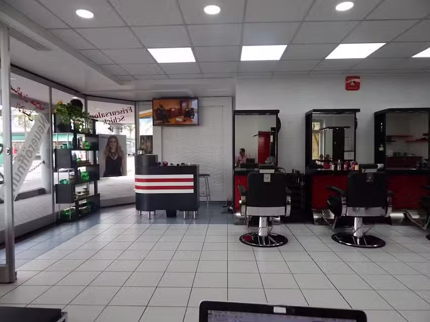 Damen- & Herrenfriseursalon Schick