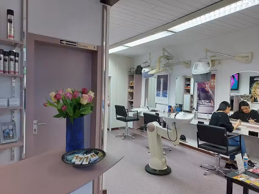 Damensalon und Herrensaloon Andre Puff