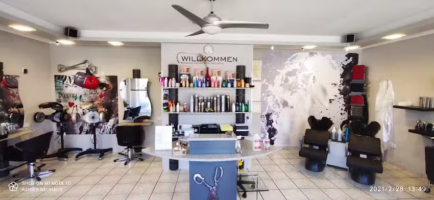 Haarschneideteam Neuhaus