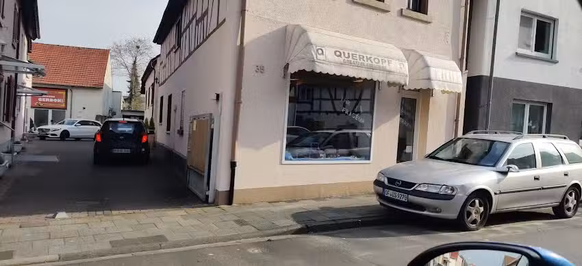 Querkopf-Friseur
